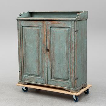 A first half of the 19th century painted cupboard.
