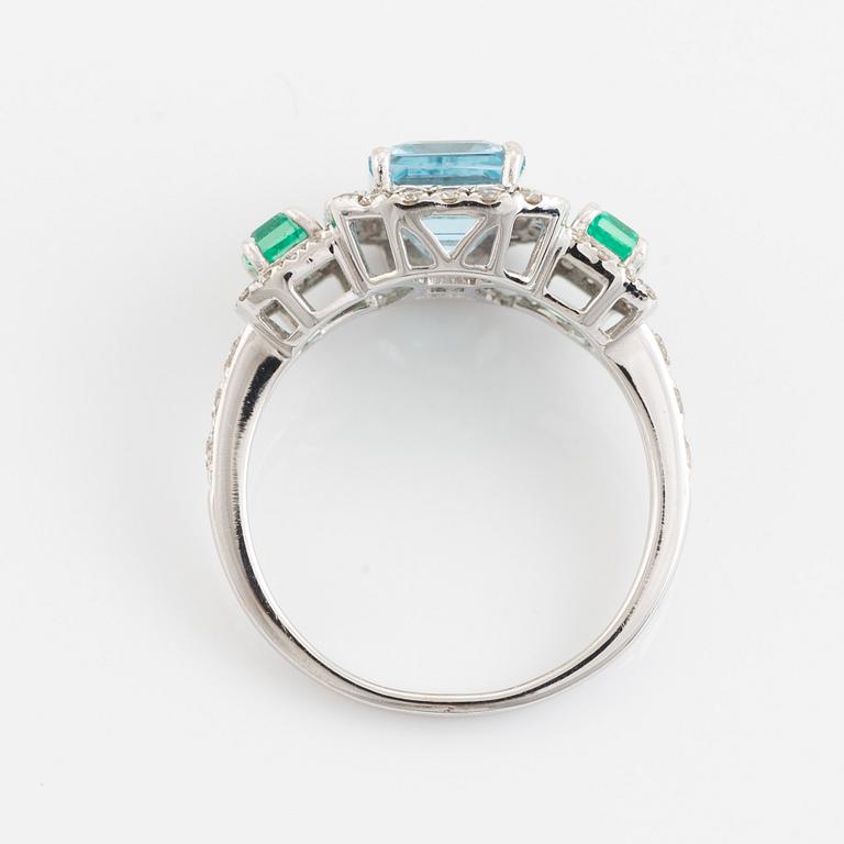 Aquamarine, emerald and brilliant-cut diamond ring.