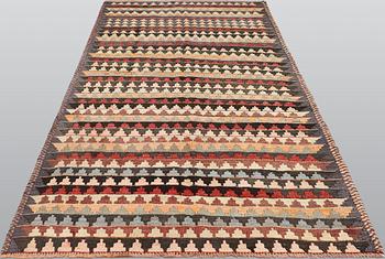 A carpet, Persian nomad Kilim, ca 283 x 140 cm.