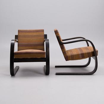 ALVAR AALTO, A PAIR OF ARMCHAIRS. NO 34/402. Manufactured by Oy Huonekalu- ja Rakennustyötehdas Ab, Turku. 1940´s.