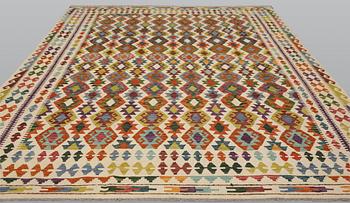 A Kilim carpet, approx. 344 x 262 cm.