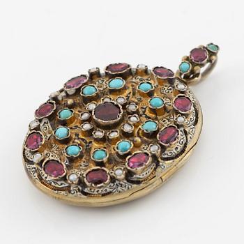 Medallion with enamel details, pearls, turquoises, and pink stones.