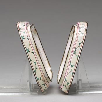 A pair of enamel on copper stands, Qing dynasty, 18th Century.