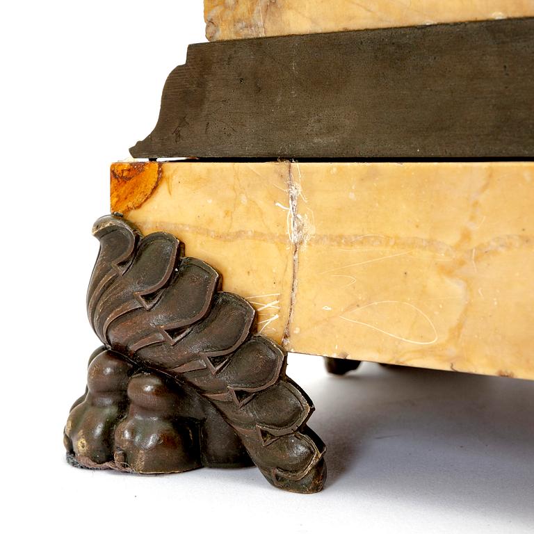 A late Empire mid 1800s table clock.