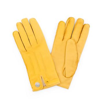 HERMÈS, a pair of yellow lambskin gloves, "Nervures Droites".
