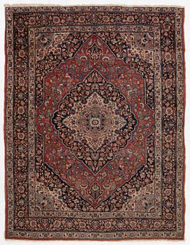 An oriental rug, c. 180 x 140 cm.