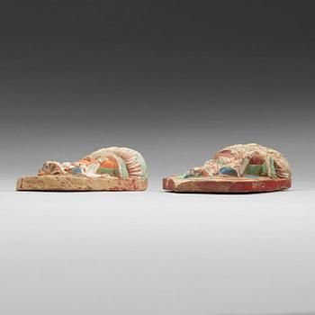 Two clay tsa-tsas, Tibet, 18/19th Century.