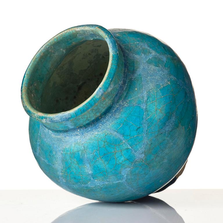 A turquoise Keshan pottery vase, central Persia, 13th century.