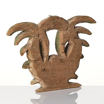 A Swedish baroque carved and painted wreath, later part 17th century.