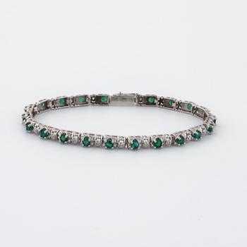 A emerald and single cut diamond bracelet.