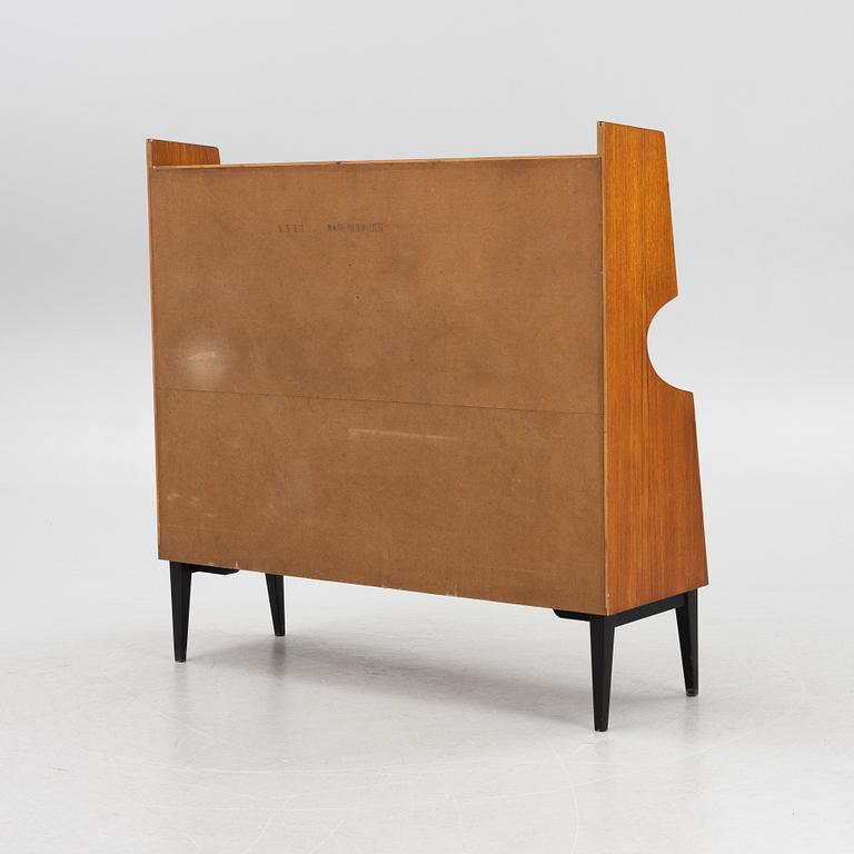 A teak-veneered bookcase, 1950's.