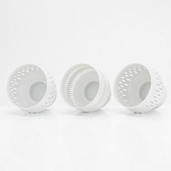 Friedl Holzer-Kjellberg, three porcelain candle holders and a "Helmi" plate, Arabia, 1970s.