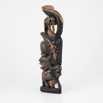 A wooden mask, Gambia, 21st Century.