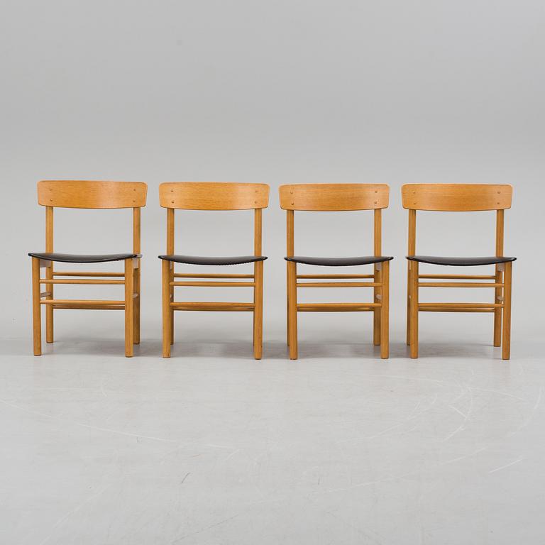 A set of four 20th century chairs.