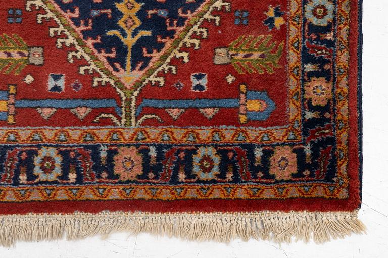 A semi-antique Kurdish runner, 350 x 140 cm.