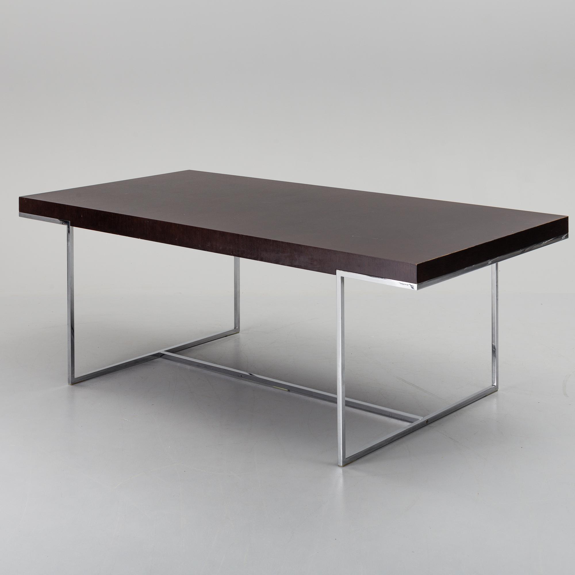 A "Athos" dining table by Paolo Piva for B&B Italia.