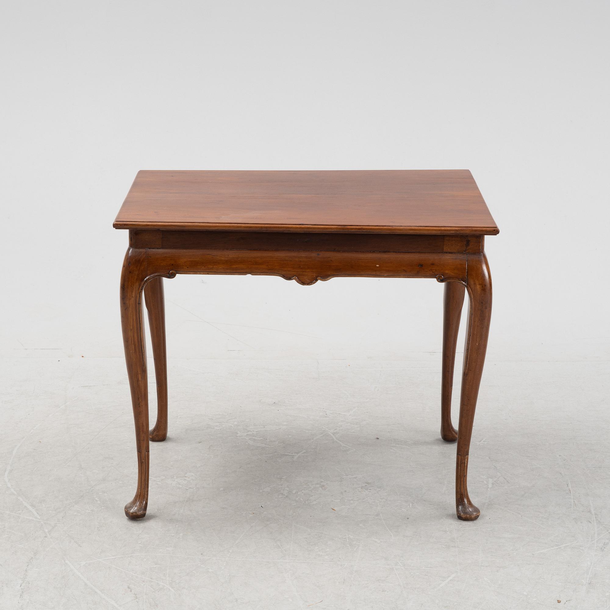 A composite mahogany table, 18th and 20th Century.