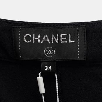 Chanel, A pair of black silk pants, size 34.