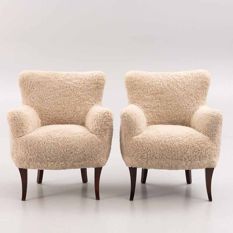 A pair of Swedish Modern armchairs, mid 20th century.