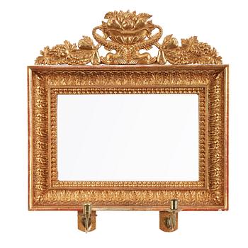 A pair of Swedish Empire first half 19th century two-light girandole mirrors.