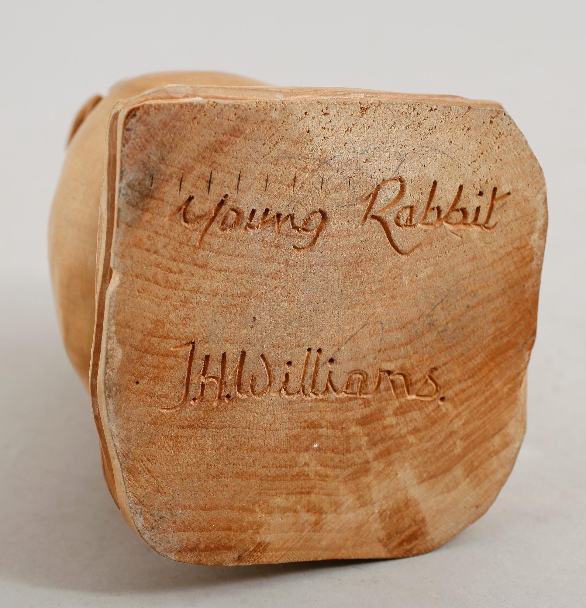 SKULPTUR, skuret trä, signerad J H Williams, 1900-talets första hälft.