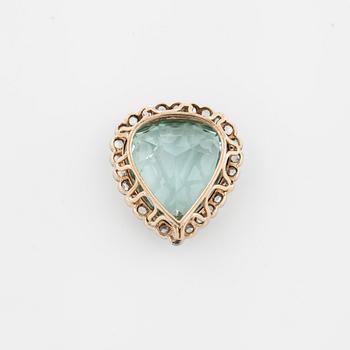 A aquamarine and rose cut diamond pendant and ring.