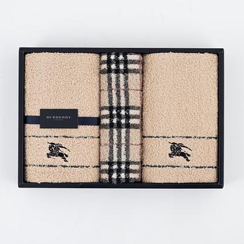 Burberry, a set of three towels.