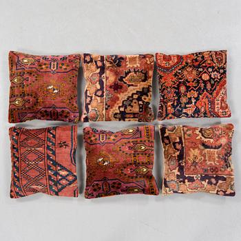 Six pillows made from rugs.