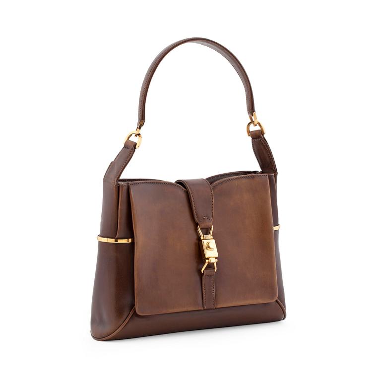 GUCCI, a brwon leather shoulder bag from the 1970s.