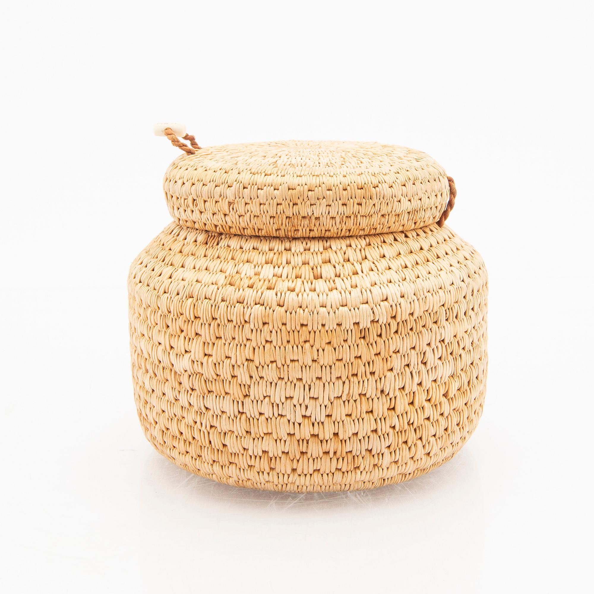 Margit Kitok-Åström, a signed box root work.