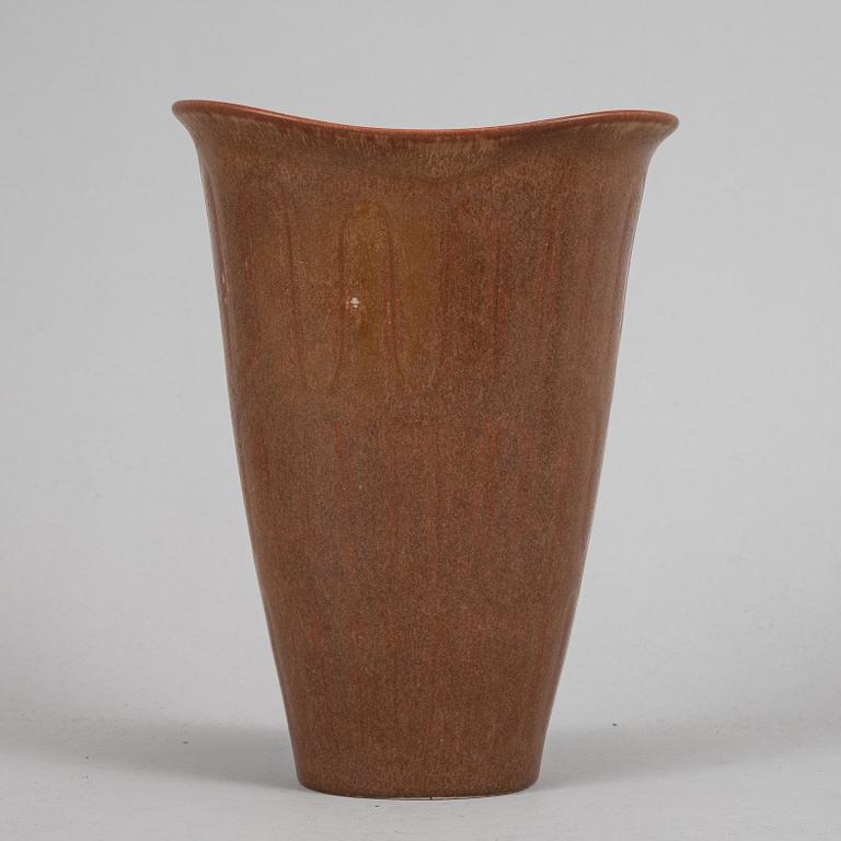 Tea pot, two bowls, two creamers, and a vase by Gunnar Nylund, stoneware, Rörstrand.