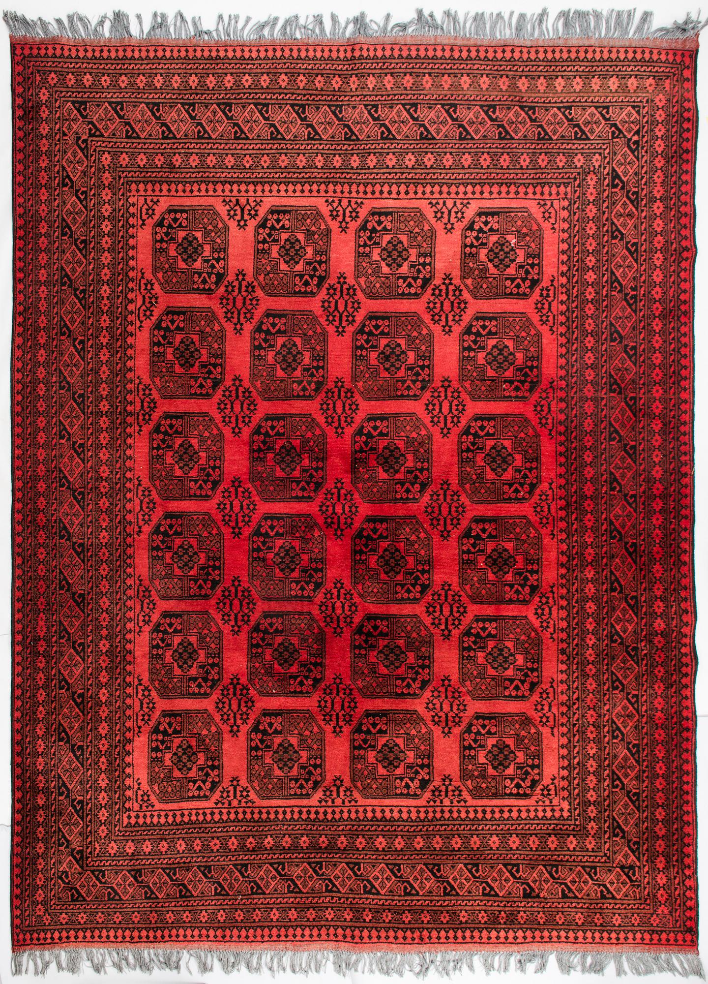 An Afghan carpet, old. Circa 255 x 337 cm.