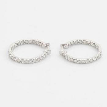 Brilliant cut diamond hoop earrings.