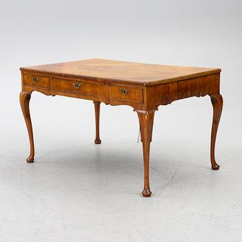 A George II walnut partner's desk, mid 18th century.