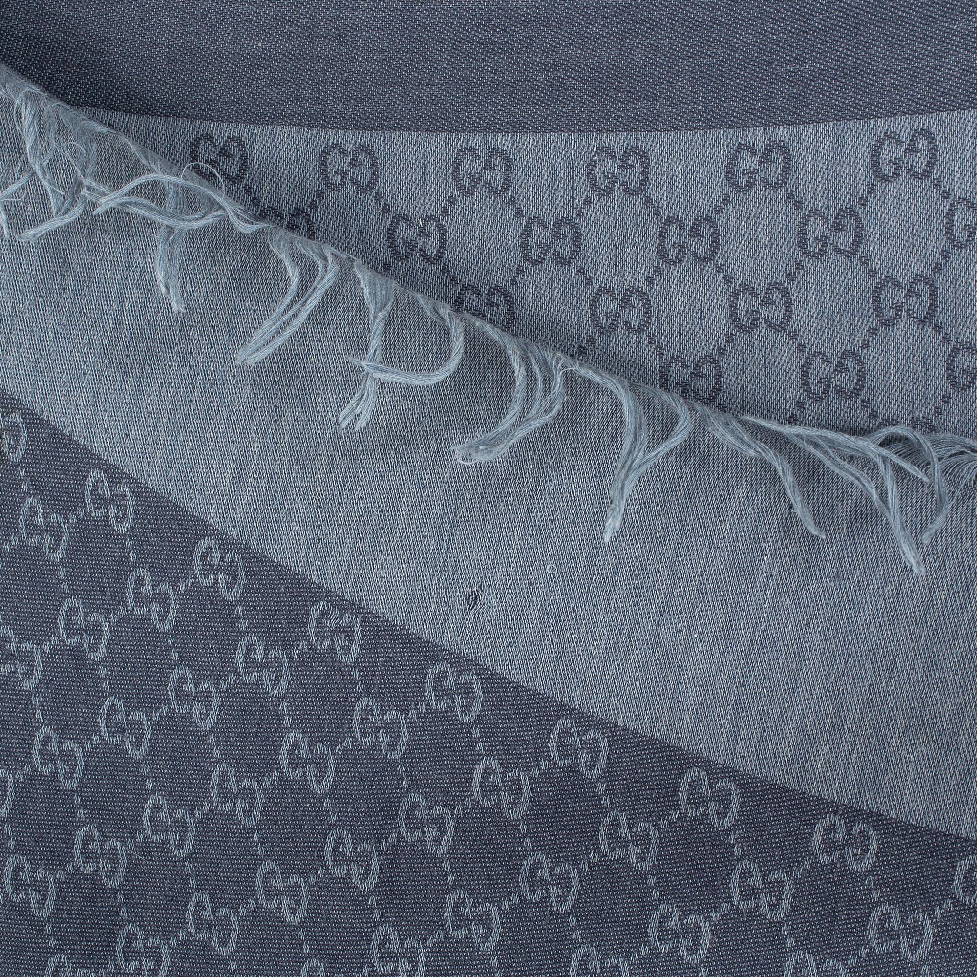 A shawl by Gucci.
