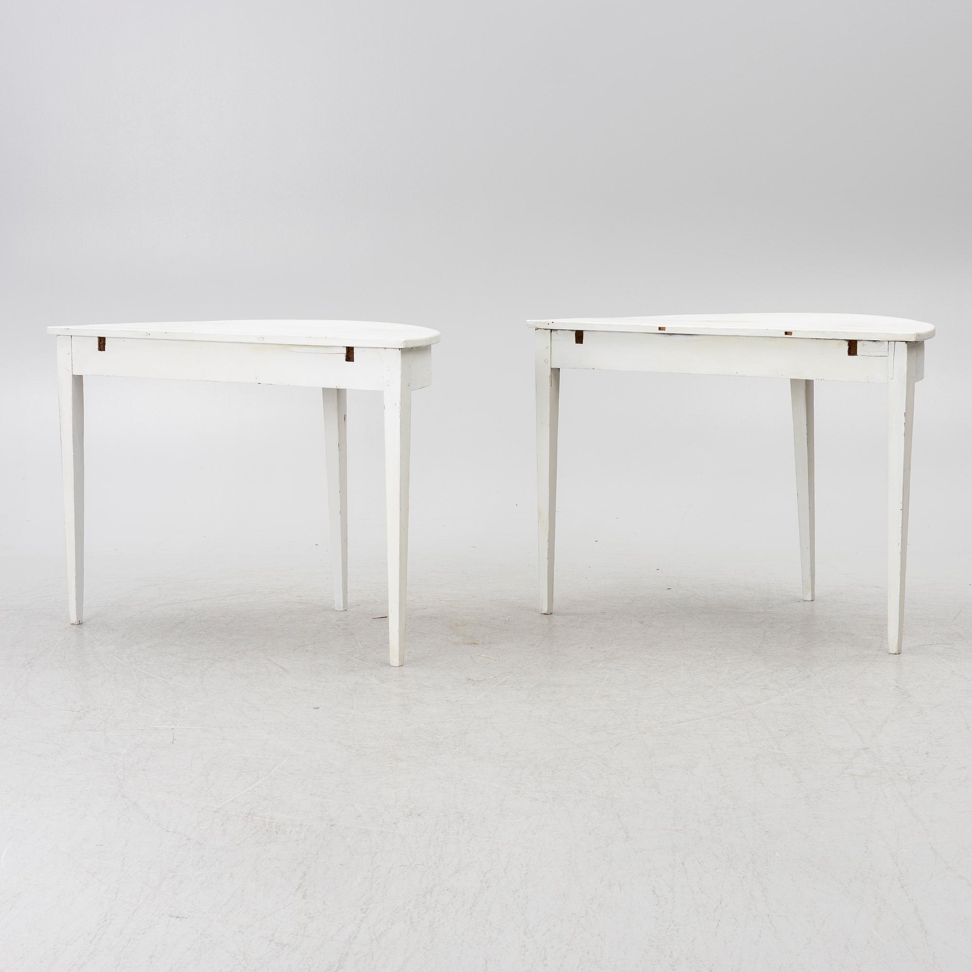 A pair of moon tables, 19th century.