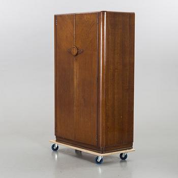 An English Lebus Furniture mens wardrobe around 1900.