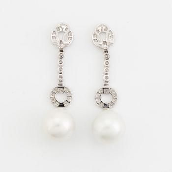 South sea pearl and brilliant cut diamond earrings.