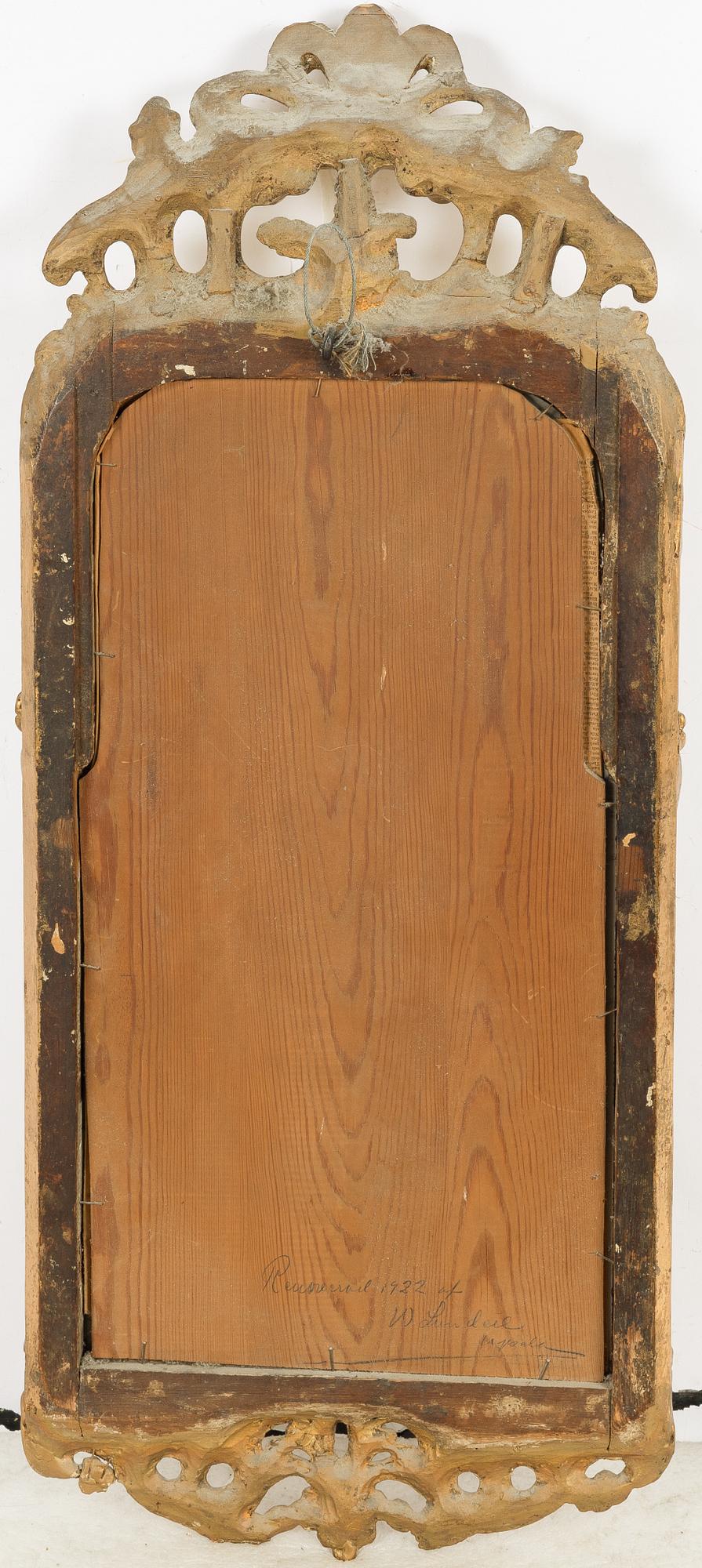 A Swedish giltwood rococo mirror, Stockholm, ltaer part 18th century.