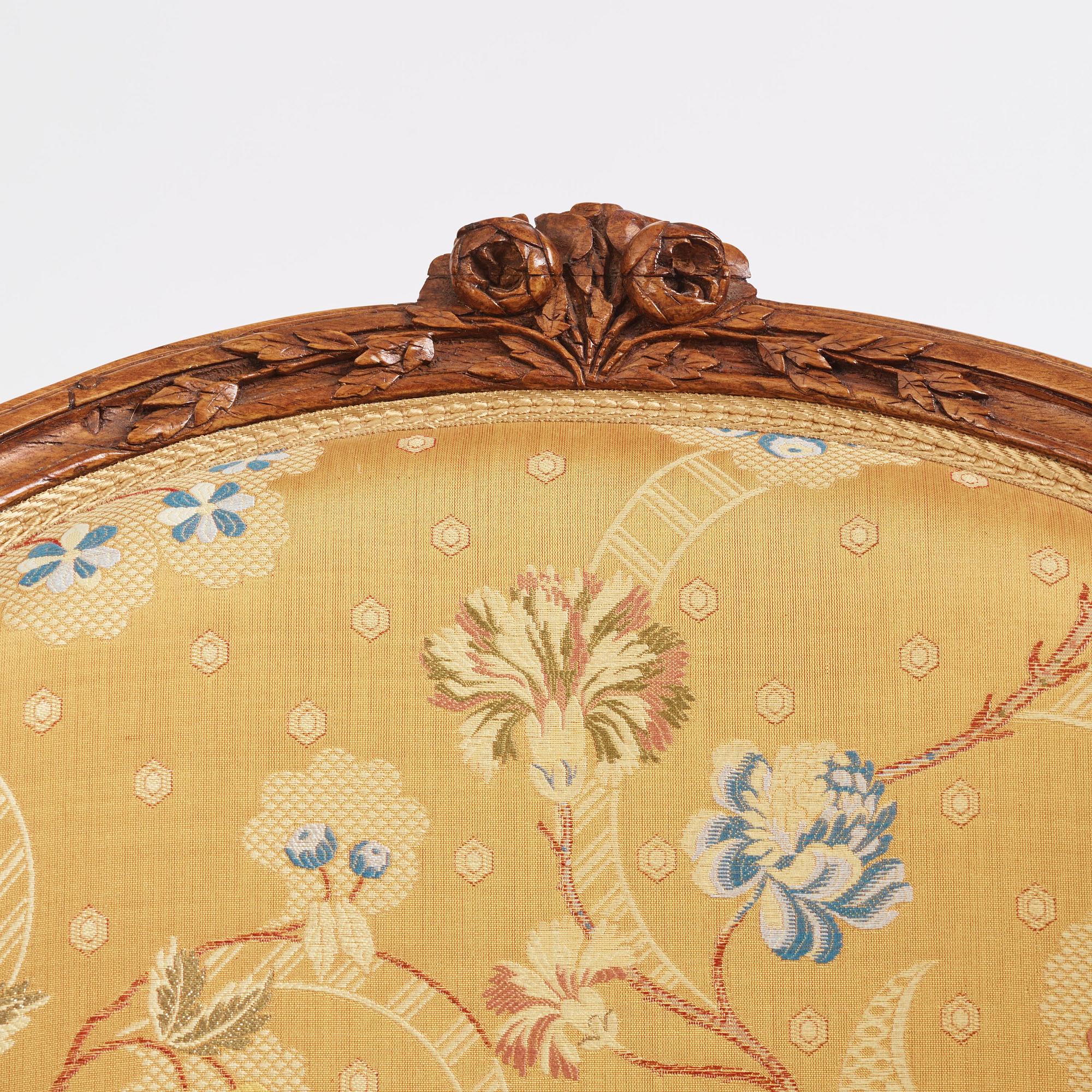 A pair of Louis XV bergeres by Georges Jacob (master in Paris 1765-1814(.