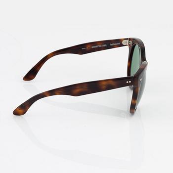 Oliver Goldsmith,a pair of tortoise "Manhattan" sunglasses.