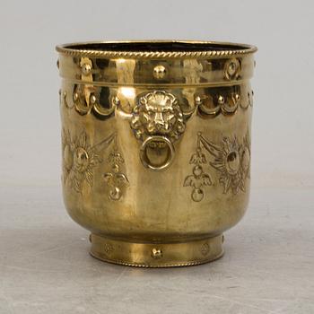 An 18th century brass flower pot.