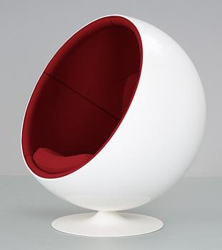 An Eero Aarnio white fiberglass and red fabric 'Ball chair', by Adelta, Finland, post 1991.