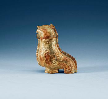 An archaistic nephrite bird shaped covered vessel.