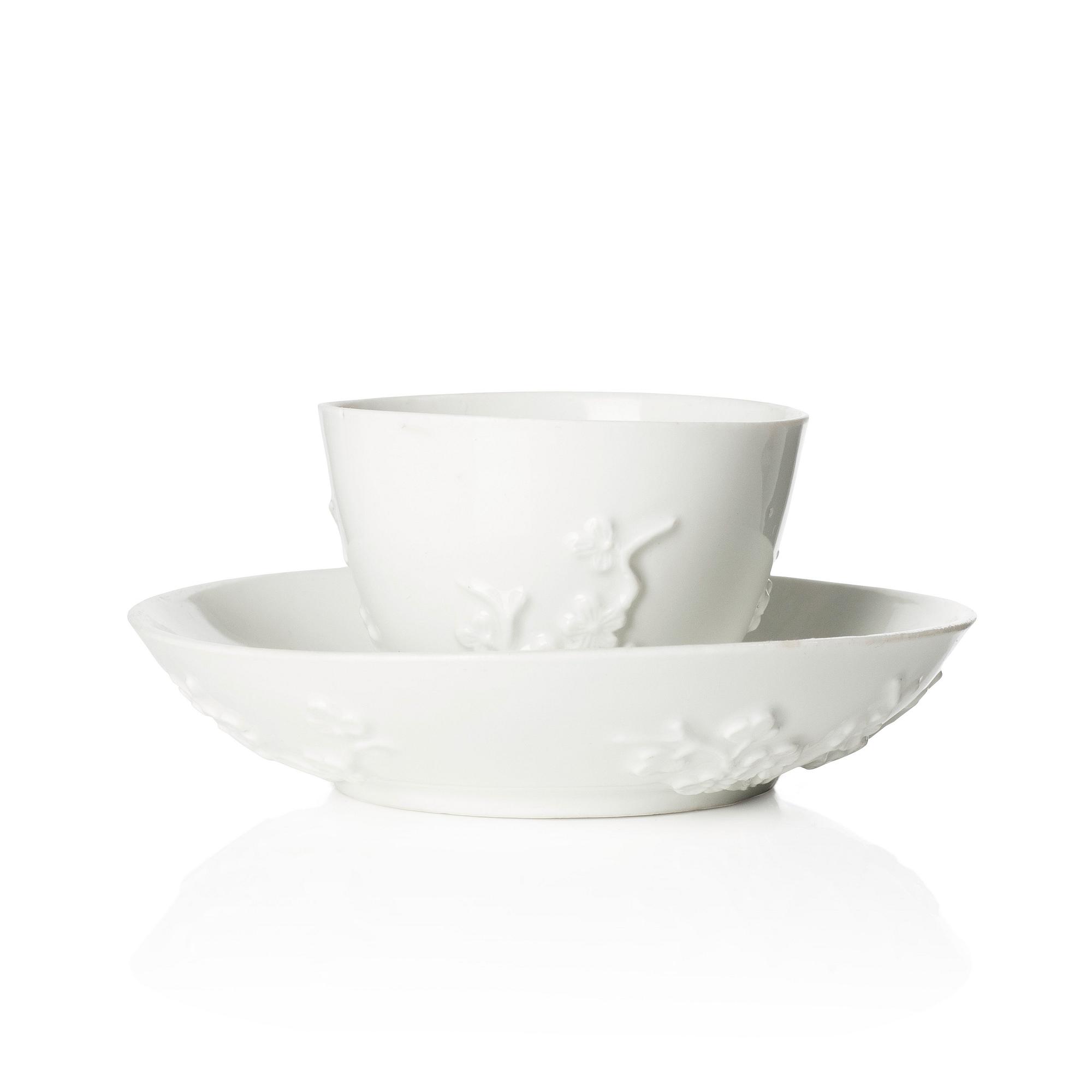 A blanc de Chine cup with saucer, Meissen, 18th century.