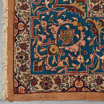 A carpet, semi-antique Tabriz, ca 404 x 292 cm.