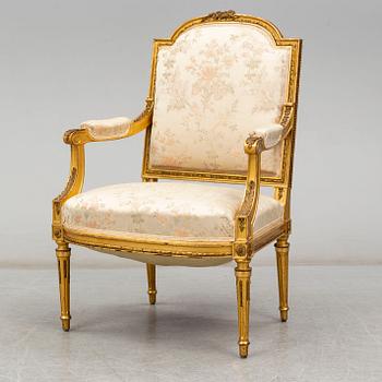 A late 19th century Louis XVI-style armchair.