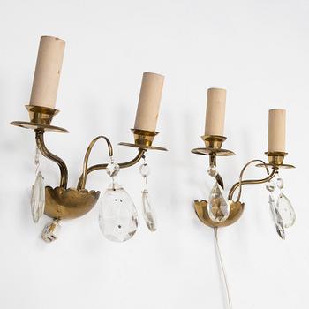 Four of mid-20th century wall sconces.