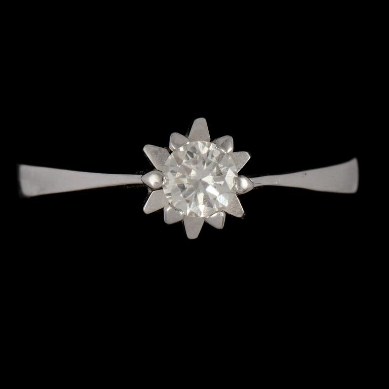 RING, 18k vitguld med briljantslipad diamant, ca 0.27 ct. sekelskifte 1900/2000-tal. Vikt 3 g.