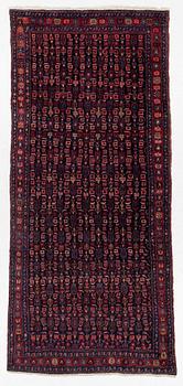 A semi-antique Bidjar carpet, c. 310 x 145 cm.